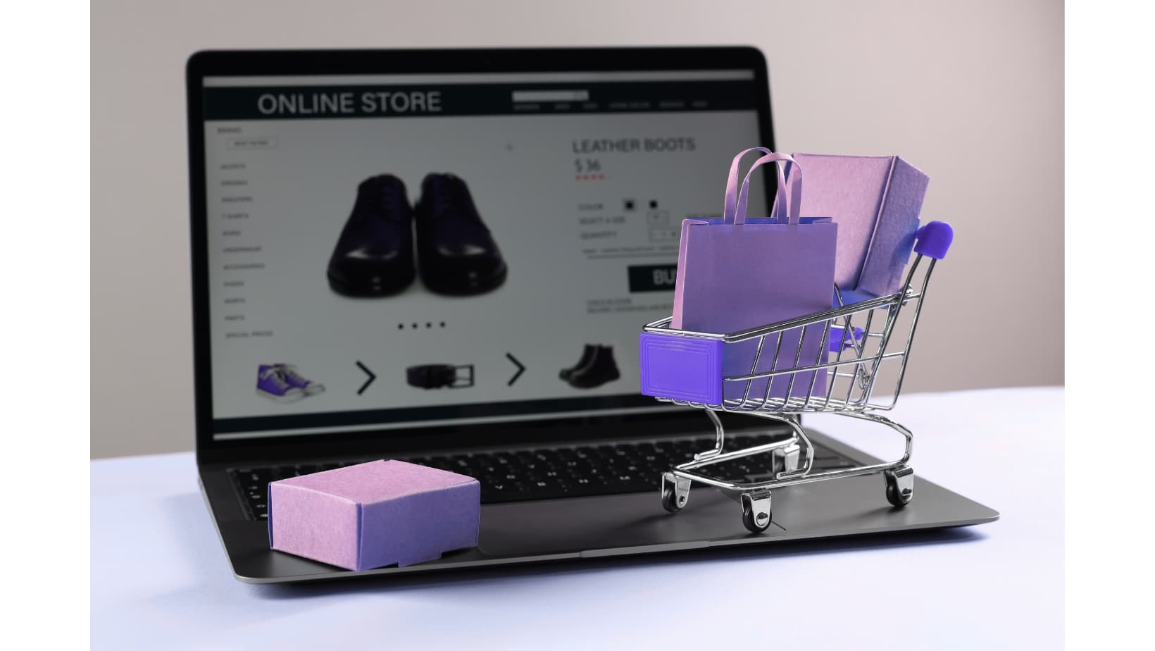 Laptop displaying a multi-vendor product marketplace with shopping cart and product boxes