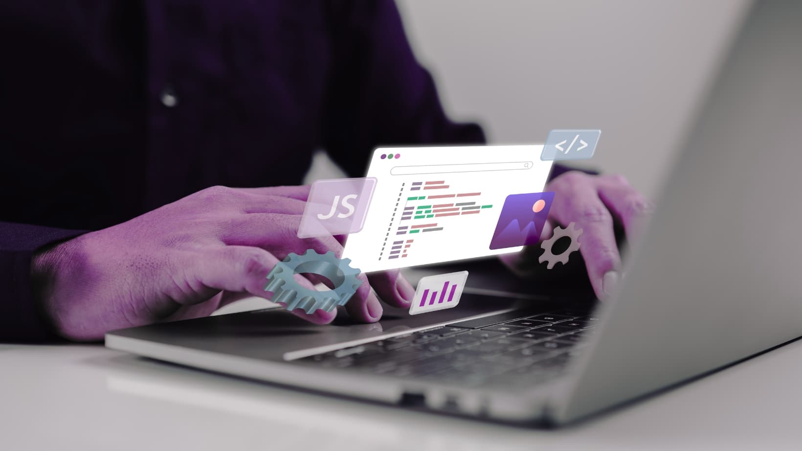 Close-up of hands working on a laptop keyboard for web maintenance